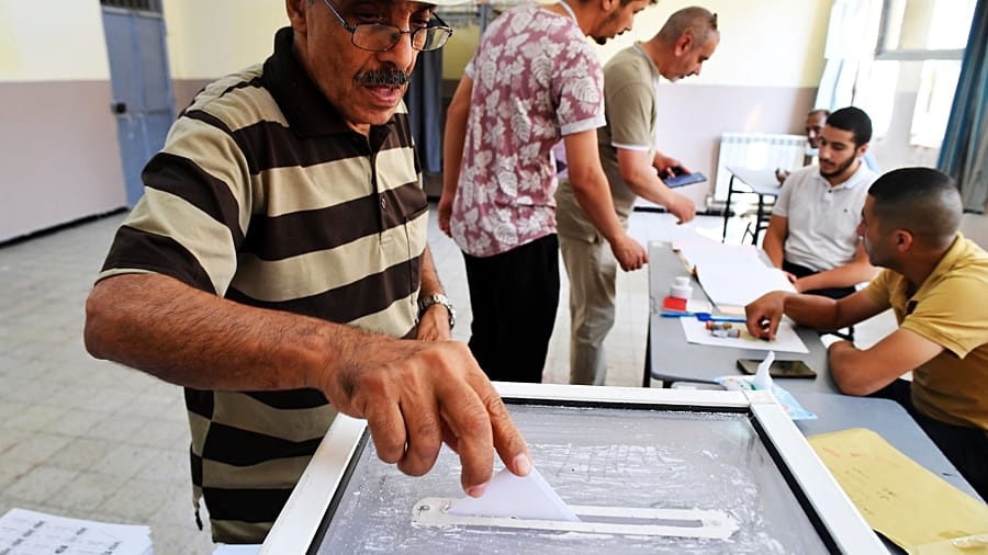 Algeria counts votes in legislative poll marked by low turnout