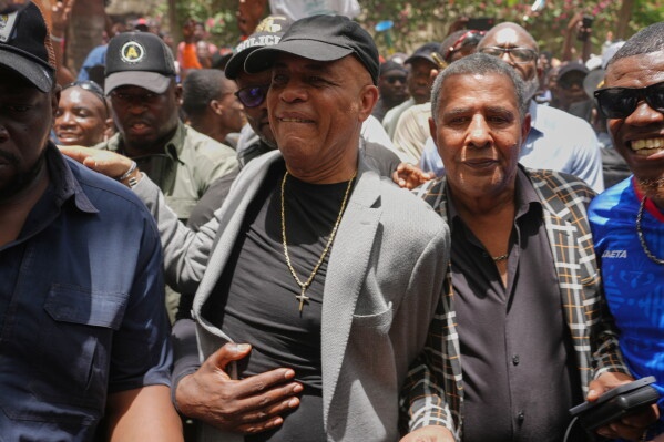 Former Haitian president expected to testify in court on rare visit home