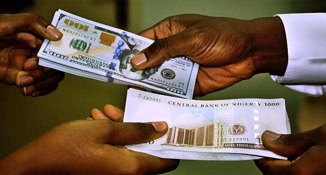 Naira holds firm at N1,367/$ as CBN keeps dollar in check