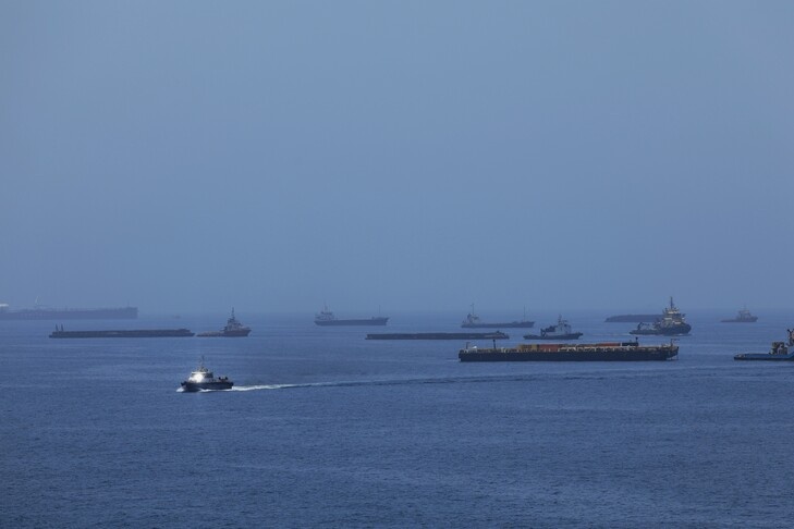 Iran says holding no talks with US, working with Oman to establish ‘temporary route’ via Hormuz